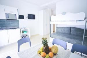 Η κουζίνα ή μικρή κουζίνα στο Villa Del Gaudio Rooms & Apartments