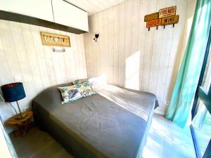 Postel nebo postele na pokoji v ubytování Bungalow Océane