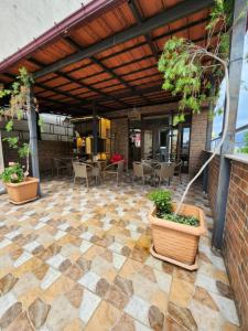 Patio nebo venkovní prostory v ubytování hotel Vaxx