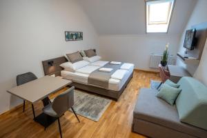 Krevet ili kreveti u jedinici u okviru objekta Végvár Spa Apartman