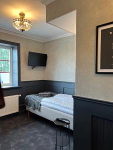 Postel nebo postele na pokoji v ubytování Central Hotellet Tierp