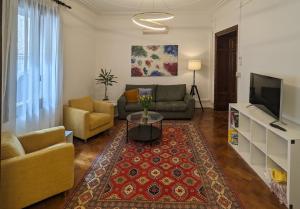 TV a/nebo společenská místnost v ubytování CA ROSON Exclusive Apt in heart of Padua