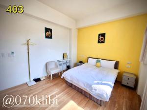 Postelja oz. postelje v sobi nastanitve Huatian B&B