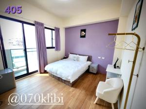 Postelja oz. postelje v sobi nastanitve Huatian B&B