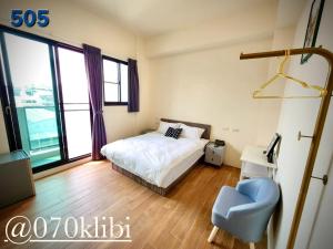 Postelja oz. postelje v sobi nastanitve Huatian B&B