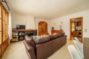 TV a/nebo společenská místnost v ubytování Casa MURTONS by Mallorca Villa Selection