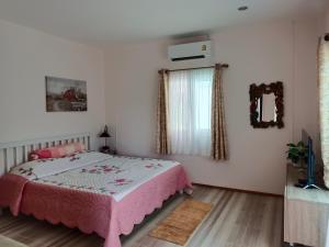 Postel nebo postele na pokoji v ubytování B&N House