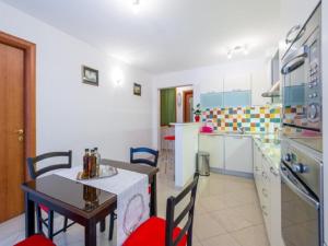 Kuchyňa alebo kuchynka v ubytovaní Feel Good Apartment