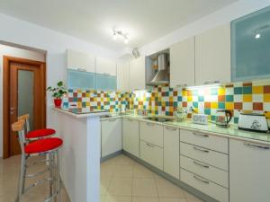 Kuchyňa alebo kuchynka v ubytovaní Feel Good Apartment
