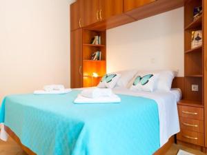 Posteľ alebo postele v izbe v ubytovaní Feel Good Apartment