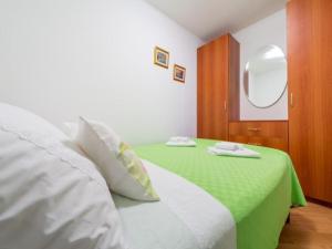 Posteľ alebo postele v izbe v ubytovaní Feel Good Apartment