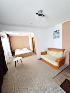 Postel nebo postele na pokoji v ubytování Vila Cristian