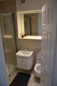 Bilik mandi di Cosy Apartment Central Bath