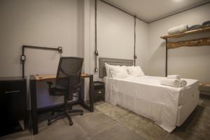 Ένα ή περισσότερα κρεβάτια σε δωμάτιο στο Hotel Viva Vida +51 φωτογραφίες