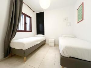 Posteľ alebo postele v izbe v ubytovaní Velarde Deluxe Beach Flat byCanary365
