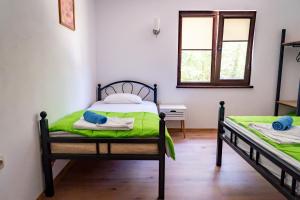 Postel nebo postele na pokoji v ubytování Бунгала - Камчия - Електрон Универс
