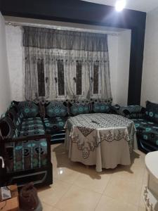 Posezení v ubytování appartement équipé 3e étage + 1 fotografie
