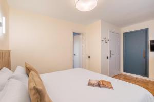 Postel nebo postele na pokoji v ubytování Granada Suites by Olala Homes