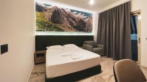 Postel nebo postele na pokoji v ubytování Hotel Ruko Boutique
