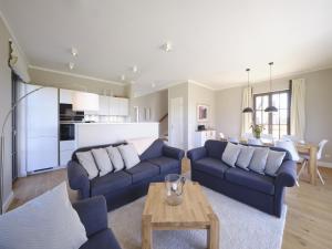 Köök või kööginurk majutusasutuses Reetland am Meer - Luxus Reetdachvilla mit 3 Schlafzimmern, Sauna und Kamin H18