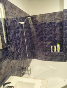 a bathroom with a shower and a sink at Beach 1 minuta,by Grand Hotel, Sheraton, molo, Best location in Sopot