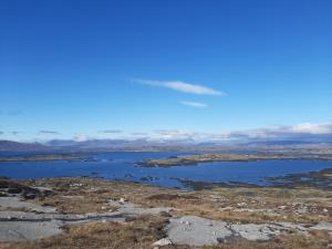 a view of a lake from the top of a mountain at The Haven in Galway
