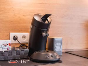 a coffee maker sitting on top of a counter at Kleine Auszeit in Friedrichshafen