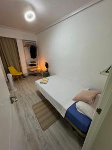 Postel nebo postele na pokoji v ubytování SuecaRoom
