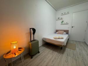 Postel nebo postele na pokoji v ubytování SuecaRoom