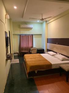 Postel nebo postele na pokoji v ubytování Hotel Skylark