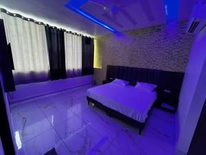 Postel nebo postele na pokoji v ubytování Hotel AJL + 5 fotografií
