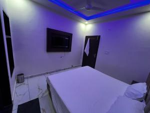 TV a/nebo společenská místnost v ubytování Hotel AJL