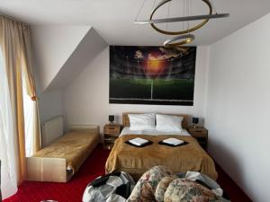 Postel nebo postele na pokoji v ubytování BUTIK Hotel 350m od plaży