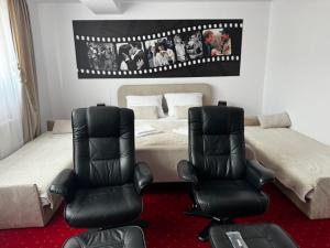Postel nebo postele na pokoji v ubytování BUTIK Hotel 350m od plaży