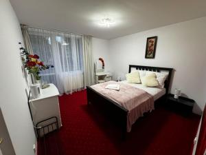 Postel nebo postele na pokoji v ubytování BUTIK Hotel 350m od plaży