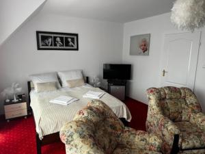 Postel nebo postele na pokoji v ubytování BUTIK Hotel 350m od plaży
