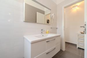 Koupelna v ubytování Apartments Dalmatia + 37 fotografií