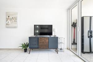 TV a/nebo společenská místnost v ubytování Apartamento VEGA Calmness and Privacy + 14 fotografií