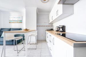 Kuchyň nebo kuchyňský kout v ubytování Apartamento VEGA Calmness and Privacy