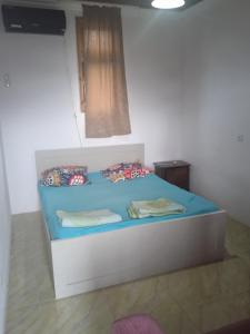 Postel nebo postele na pokoji v ubytování Hotel Poseidon