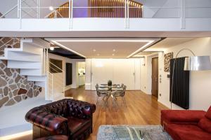 a living room with a couch and a table at Pantheon Luxury Apartment in Rome