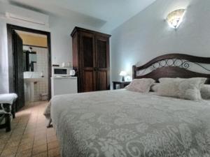 Łóżko lub łóżka w pokoju w obiekcie Casa Lareymora