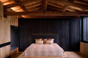 Postel nebo postele na pokoji v ubytování Appartament, Resort Corte Renèè, lago di Garda