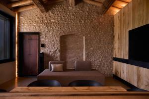 TV a/nebo společenská místnost v ubytování Appartament, Resort Corte Renèè, lago di Garda