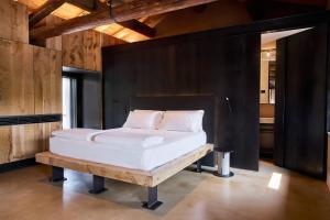 Postel nebo postele na pokoji v ubytování Appartament, Resort Corte Renèè, lago di Garda