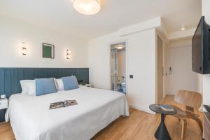 Postel nebo postele na pokoji v ubytování Granada Suites by Olala Homes