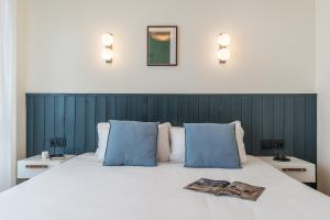 Postel nebo postele na pokoji v ubytování Granada Suites by Olala Homes