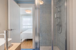 Koupelna v ubytování Granada Suites by Olala Homes