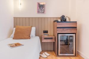 Postel nebo postele na pokoji v ubytování Granada Suites by Olala Homes