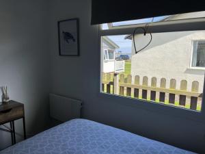 Ένα ή περισσότερα κρεβάτια σε δωμάτιο στο Seaside Escape Chalet in Bridlington south shore